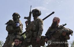 "러시아 바꾸기 위해"…우크라편에 서 총든 러시아인들